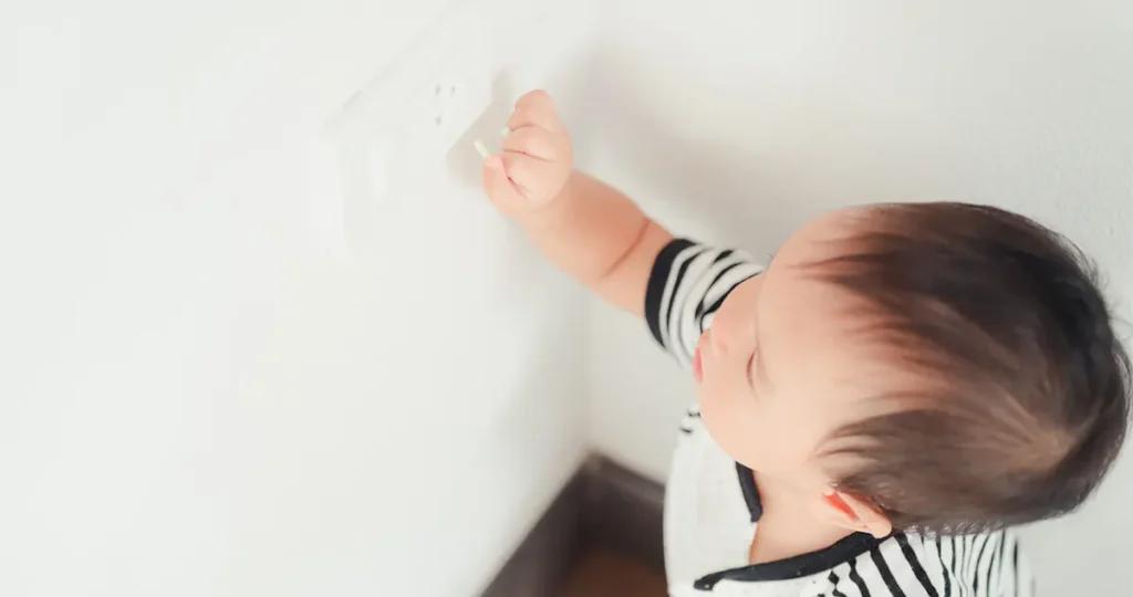 baby near electrical outlet